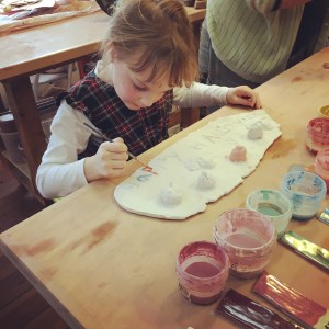 Painting her Lauren Original Halloween sign.
